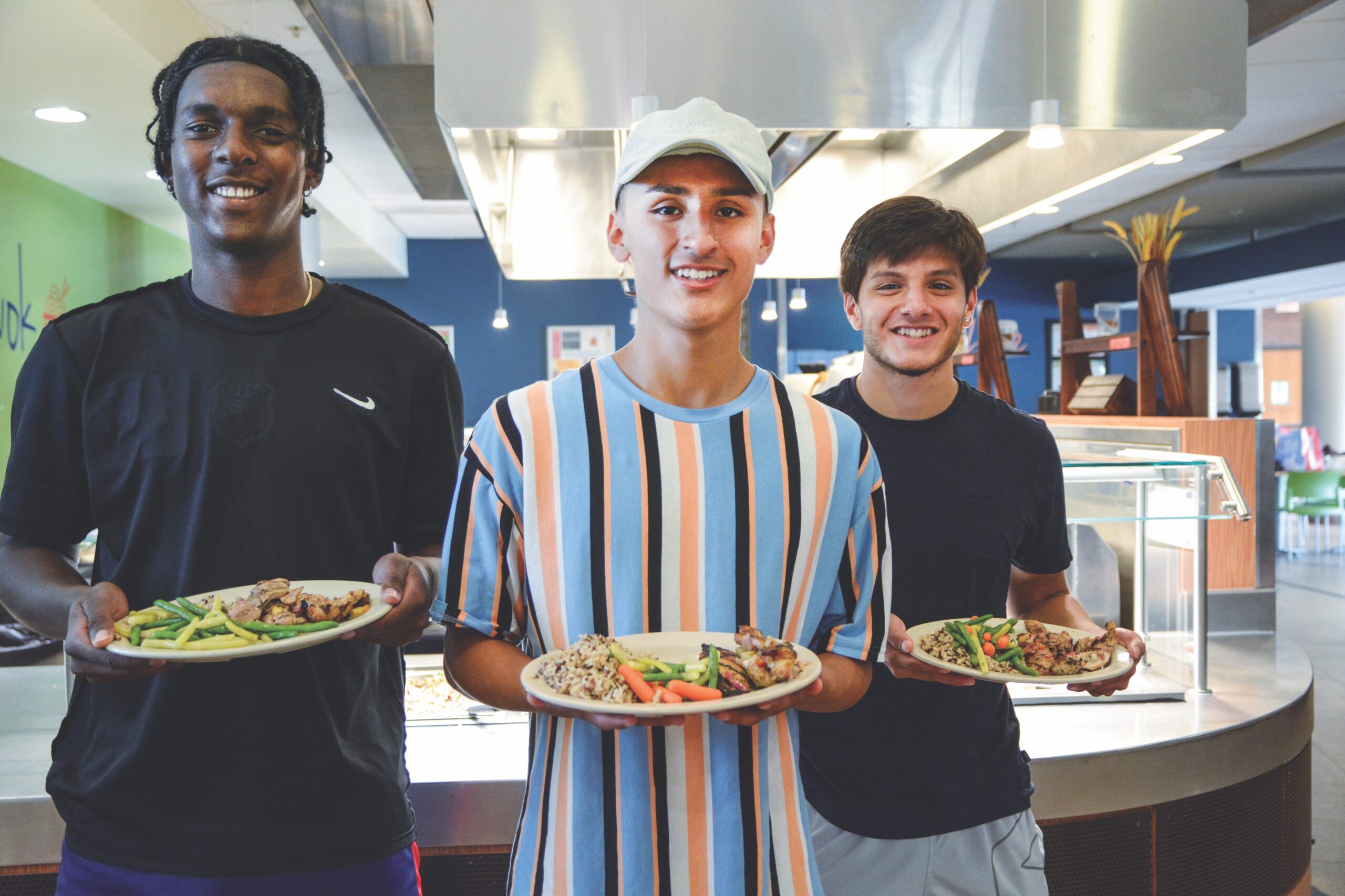 Students working in their college dining program